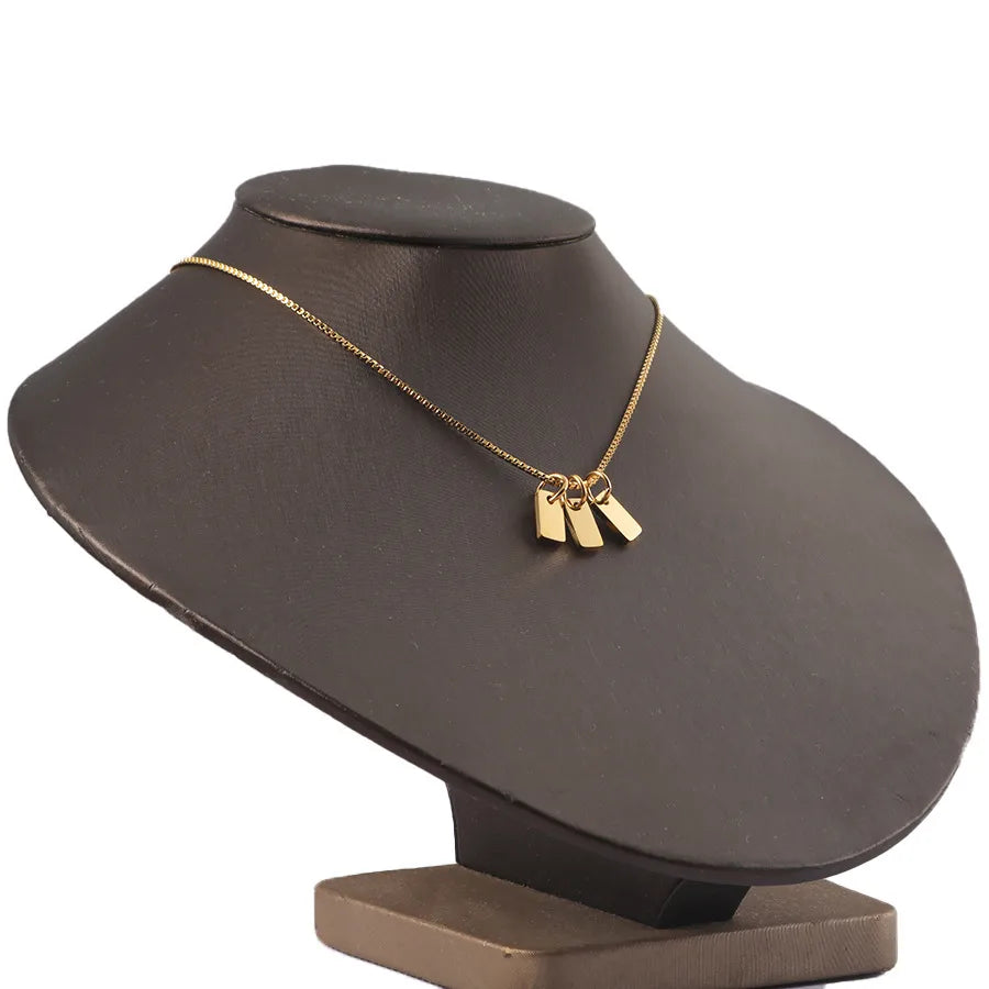 Collar con colgante rectangular de acero y titanio 3 rectangulos